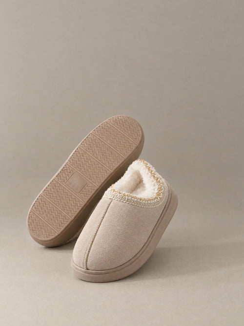 Cloud Fluff Slippers pair showing sherpa lining and sole